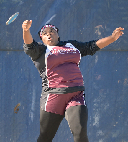 Jeff Lange | The Vindicator  MAY 22, 2015 - Boardman discus thrower Ka'nisha White launches the discus during the third flight finals of the women's discus throw at Austintown High School during the DI district track meet, Friday afternoon. White took fourth place with a throw of 111 feet 10 inches.