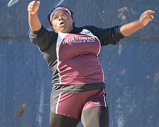 Jeff Lange | The Vindicator  MAY 22, 2015 - Boardman discus thrower Ka'nisha White launches the discus during the third flight finals of the women's discus throw at Austintown High School during the DI district track meet, Friday afternoon. White took fourth place with a throw of 111 feet 10 inches.