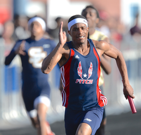 Jeff Lange | The Vindicator  MAY 22, 2015 - Joe Harrington of Fitch sprints the final 100 meters of the men's 4x200 meter relay during Friday's DI district track meet at Fitch High School.