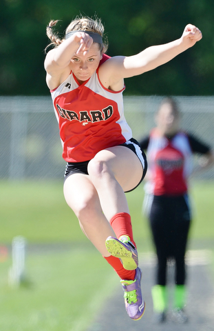 Jeff Lange | The Vindicator  MAY 23, 2015 - Girard senior Brandi Shonce leaps through the air in the girls long jump competition during Saturday's DII district meet at Lakeview High School. Shonce captured first place in long jump for Girard with a winning jump of 16 feet.