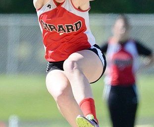 Jeff Lange | The Vindicator  MAY 23, 2015 - Girard senior Brandi Shonce leaps through the air in the girls long jump competition during Saturday's DII district meet at Lakeview High School. Shonce captured first place in long jump for Girard with a winning jump of 16 feet.