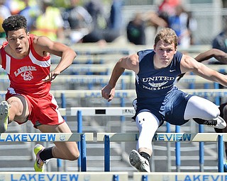 Jeff Lange | The Vindicator  MAY 23, 2015 - United's Riley Fillman (right) competes in the boys 110 meter hurdle event against Labrae's Keevon Harris (left) during Saturday's DII district track finals at Lakeview High School. Fillman placed first with a time of 14.48 seconds setting a meet record for the 110 meter hurdle event.