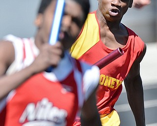 Jeff Lange | The Vindicator  MAY 23, 2015 - Mooney's Syied Bowers (right) competes in the boys 4x200 meter relay during Saturday's DII district finals meet at Lakeview High School.