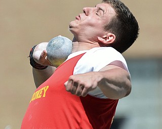 Jeff Lange | The Vindicator  MAY 23, 2015 - Mooney senior Dante Penza prepares to release the shot during the finals of the boys shot put event at the DII district track meet at Lakeview High School.