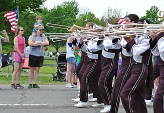 Jeff Lange | The Vindicator  MAY 25, 2015 - Spectators watch and cheer as the Boardman High School Marching Band plays during the Memorial Day Parade on U.S. 224 in Boardman, Monday morning.