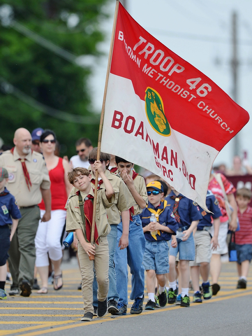 Jeff Lange | The Vindicator  MAY 25, 2015 - Micah Hillman of Troop 46 in Boardman carries the flag in the Memorial Day Parade in Boardman, Monday morning.