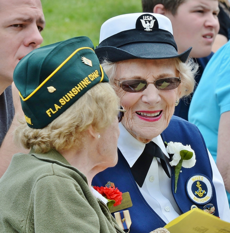 Jeff Lange | The Vindicator  MAY 25, 2015 - United States Navy Veteran of 1943-1946 Store Keeper First Class Betty Harris (right) shares a moment of joy with Private First Class Florence Pearl who served in the Army from 1942-1945.