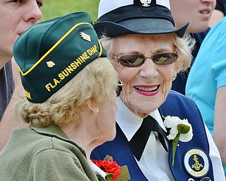 Jeff Lange | The Vindicator  MAY 25, 2015 - United States Navy Veteran of 1943-1946 Store Keeper First Class Betty Harris (right) shares a moment of joy with Private First Class Florence Pearl who served in the Army from 1942-1945.