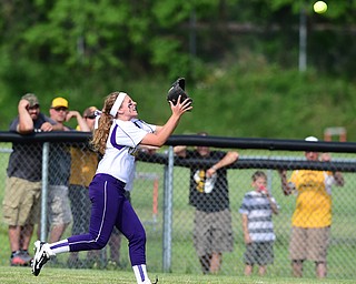 MASSILLON, OHIO - MAY 27, 2015: Left fielder Mckenzie Zigmont #3 of Champion gets under a fly ball for the 2nd out it he top of the 2nd inning during Wednesday nights Regional Semi-Final game at Massillon High School. Champion won 6-5 in 9 innings. (Photo by David Dermer/Youngstown Vindicator)