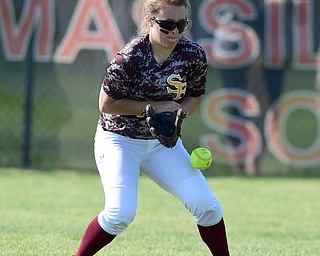 MASSILLON, OHIO - MAY 28, 2015: Center fielder Jordan Youngs #17 of South Range bobbles the softball after an Elyria Catholic hit in the top of the 3rd inning during Thursday nights game at Massillon High School. (Photo by David Dermer/Youngstown Vindicator)