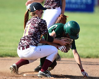 MASSILLON, OHIO - MAY 28, 2015: Stort Stop Sarah Moretti #11 of South Range unsuccessfully attempts to tag out Sammy Filiaggiss #8 of Elyria Catholic on a steal attempt during the top of the 4th inning during Thursday nights game at Massillon High School. (Photo by David Dermer/Youngstown Vindicator)