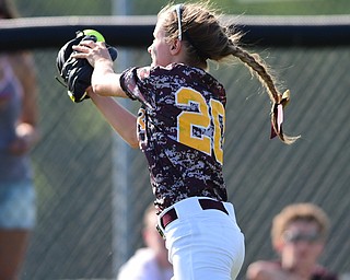 MASSILLON, OHIO - MAY 28, 2015: Left fielder Morgan Czopur #20 of South Range drops the softball allowing runs to advance in the top of the 5th inning during Thursday nights game at Massillon High School. (Photo by David Dermer/Youngstown Vindicator)