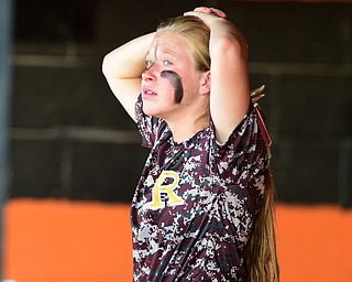 MASSILLON, OHIO - MAY 28, 2015: Codi Taylor #4 of South Range reacts in the dugout after being the 1st out in the top of the 6th inning during Thursday nights game at Massillon High School. (Photo by David Dermer/Youngstown Vindicator)