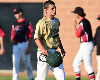 MASSILLON, OHIO - MAY 28, 2015: Joel Hake #9 of Ursuline reacts after flying out to center field for the 3rd out in the bottom of the 7th inning during Thursday nights game at Massillon High School. (Photo by David Dermer/Youngstown Vindicator)