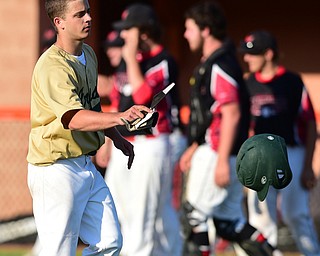 MASSILLON, OHIO - MAY 28, 2015: Joel Hake #9 of Ursuline reacts after flying out to center field for the 3rd out in the bottom of the 7th inning during Thursday nights game at Massillon High School. (Photo by David Dermer/Youngstown Vindicator)