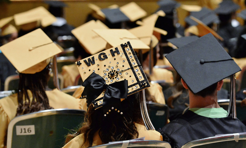 Jeff Lange | The Vindicator  MAY 28, 2015 - Cap of a Harding grad is decorated in school spirit.