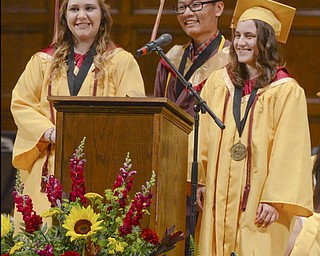 Katie Rickman | The Vindicator.Liberty High School  Valedictorians (L-R) Allison Beckinger, Shunran Xu and Debra Fabian smiles as they take turns speaking at the commencement ceremony at Stambaugh Auditorium.