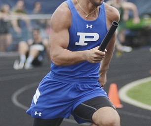 Katie Rickman | The Vindicator.Gino Centofanti of Poland Seminaryrun the 4x200 Meter Relay during the Division 2 Region 5 Track Meet at Austintown Fitch High School. ..