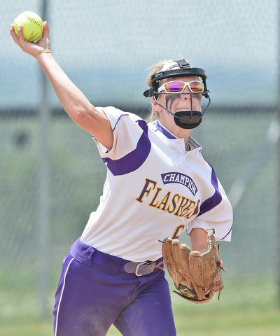 Jeff Lange | The Vindicator  MAY 30, 2015 - Champion third baseman Brittany Allen looks to make the throw to first for the first out of the top of the fifth inning against Elyria, Saturday afternoon during the regional championship game in Massillon.