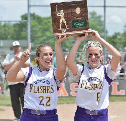 Jeff Lange | The Vindicator  MAY 30, 2015 - Champion seniors Haylee Gardiner (left) and Brittany Allen hold the plaque above their heads after their victory against Elyria, Saturday afternoon.