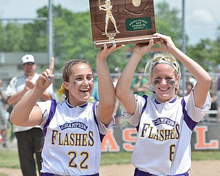 Jeff Lange | The Vindicator  MAY 30, 2015 - Champion seniors Haylee Gardiner (left) and Brittany Allen hold the plaque above their heads after their victory against Elyria, Saturday afternoon.