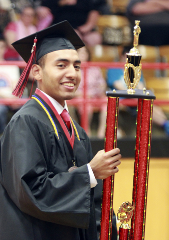 William D. Lewis The Vindicator  Campbell Memorial valedictorian George Encarnacion Jr. is awarded a trophy during commencement ceremony 6-4-15 at Campbell HS.