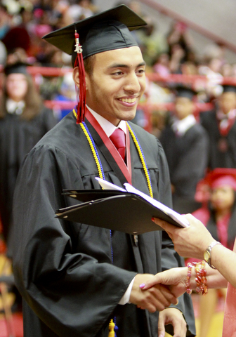 William D. Lewis The Vindicator  Campbell Memorial 2015 valedictorian George Encarnacion Jr. is awarded his diploma during commencement ceremony 6-4-15 at Campbell HS.