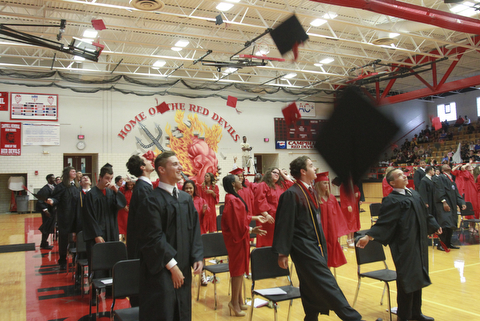 William D. Lewis The Vindicator  Campbell Memorial grads toss their caps during commencement ceremony 6-4-15 at Campbell HS.