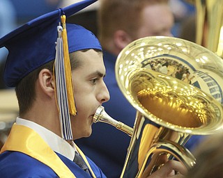 William D. Lewis The Vindicator  Jackson Milton grad Thomas Carnes plays one last number with hte band during Friday commencement at JM HS. He also was one of 8 valedictorians.