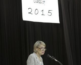        ROBERT K. YOSAY  | THE VINDICATOR.. Theresa Dellick  welcomes and congratulates all the students friends and families..to the Mahoning County High School graduation.the former  P.S. Berry School,