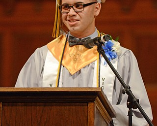 Katie Rickman | The Vindicator.Raymar Rivera valedictorian for East High School’s class of 2015 addresses fellow graduates at the commencement ceremony at Stambaugh Auditorium June 5, 2015.