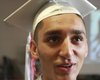 William d Lewis the Vindicator Chaney grad Buker Abu-Hashim hopes to become a MD.