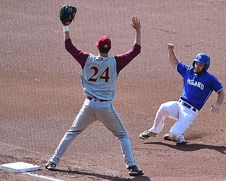 COLUMBUS, OHIO - JUNE 5, 2015: Base runner Anthony Calcagni #4 of Poland slides into third base after a sacrifice fly in the top of the 1st inning during Friday mornings Division 2 semi-final game at Huntington Park. Poland won 2-0. (Photo by David Dermer/Youngstown Vindicator)