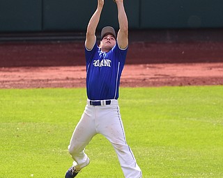 COLUMBUS, OHIO - JUNE 5, 2015: Left fielder Nick Romeo #10 of Poland leaps in the air to snag the ball for the 3rd out in the bottom of the 1st inning during Friday mornings Division 2 semi-final game at Huntington Park. Poland won 2-0. (Photo by David Dermer/Youngstown Vindicator)