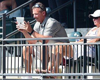 COLUMBUS, OHIO - JUNE 5, 2015: Ohio State head football coach Urban Meyer records his sons at bat on an iPad in the bottom of the 2nd inning during Friday mornings Division 2 semi-final game at Huntington Park. Poland won 2-0. (Photo by David Dermer/Youngstown Vindicator)