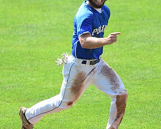COLUMBUS, OHIO - JUNE 5, 2015: Anthony Calcagni #4 of Poland jogs home to score a run after Jared Burkert was hit by a pitch with the bases loaded in the top of the 3rd inning during Friday mornings Division 2 semi-final game at Huntington Park. Poland won 2-0. (Photo by David Dermer/Youngstown Vindicator)