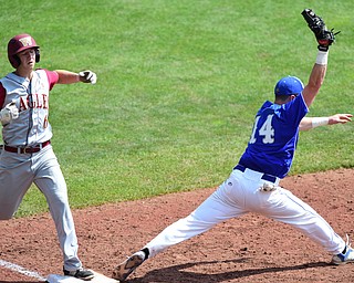 COLUMBUS, OHIO - JUNE 5, 2015: First basemen Jake Hawkins #14 of Poland stretches out while keeping his foot on the bag to force out base runner Alex Gabel #6 for the 3rd out in the bottom of the 4th inning during Friday mornings Division 2 semi-final game at Huntington Park. Poland won 2-0. (Photo by David Dermer/Youngstown Vindicator)