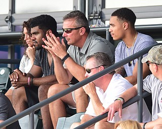 COLUMBUS, OHIO - JUNE 5, 2015: Ohio State head football coach Urban Meyer watches the baseball game with running backs Jalin Marshall (right) and Ezekiel Elliott (left) during Friday mornings Division 2 semi-final game at Huntington Park. Poland won 2-0. (Photo by David Dermer/Youngstown Vindicator)