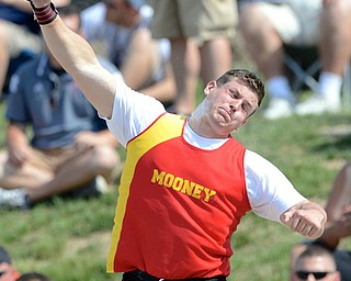 Jeff Lange | The Vindicator  JUNE 5, 2015 - Cardinal Mooney's Dante Penza releases the shot in the finals of Friday's boys shot put event held across the street from Jesse Owens Memorial Stadium in Columbus during the 2015 state track and field tournament.