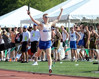 Jeff Lange | The Vindicator  JUNE 5, 2015 - Maplewood sophomore Jake Hall raises his arms in victory as he crosses the finish line in Friday's DIII boys 4x800 meter relay during the 2015 state track and field tournament held at Jesse Owens Memorial Stadium in Columbus. Maplewood's 4x800 team finished first with a combined time of 7:49.02.