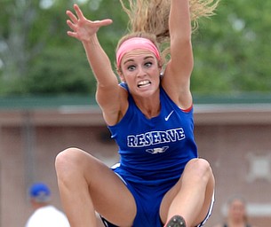Jeff Lange | The Vindicator  JUNE 5, 2015 - Western Reserve's Hannah Grace leaps through the air in the girls long jump event during the 2015 track and field tournament held at Jesse Owens Memorial Stadium in Columbus, Friday.