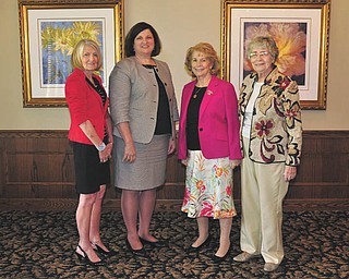 SPECIAL TO THE VINDICATOR
Above from left are Betty Cmil; Dr. Elena Rossi, winner of the Youngstown Area Federation of Women’s Clubs Community Service Award; Barbara Higgins, winner of the YAFWC Woman of the Year Award; and Elva Easton, president pro-tem of YAFWC.