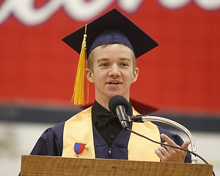       .         ROBERT  K. YOSAY | THE VINDICATOR..Benjamin Davenport speaks as one of 14 Valedictorians. Over 300 Austintown Fitch graduates received their diplomas at Saturday Morning commencement in the High School Gym..-30-