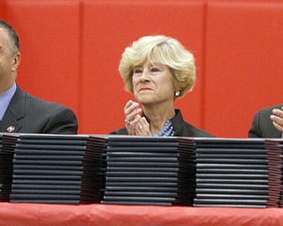       .         ROBERT  K. YOSAY | THE VINDICATOR.. Superintendent Vincent Colaluca - President of the board Kathy Mock and Dr David Ritchie  VP of the board.. applaud the senior speech behind the diplomas.. Over 300 Austintown Fitch graduates received their diplomas at Saturday Morning commencement in the High School Gym..-30-