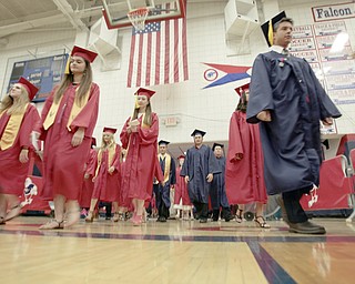       .         ROBERT  K. YOSAY | THE VINDICATOR..Seniors enter the gym for commencement.. Over 300 Austintown Fitch graduates received their diplomas at Saturday Morning commencement in the High School Gym..-30-