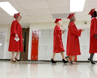       .         ROBERT  K. YOSAY | THE VINDICATOR...Fitch Seniors start the walk to commencement.. Over 300 Austintown Fitch graduates received their diplomas at Saturday Morning commencement in the High School Gym..-30-
