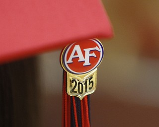       .         ROBERT  K. YOSAY | THE VINDICATOR... Over 300 Austintown Fitch graduates received their diplomas at Saturday Morning commencement in the High School Gym..-30-