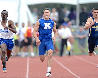 Jeff Lange | The Vindicator  JUNE 6, 2015 - Warren JFK's Jacob Coates (center) sprints the final 100 meters of the 200 meter dash against Cincinnati Christian's Kameron Antwine (left) and Archibald's Levi Wyse during Saturday's 2015 state track and field tournament held at Jesse Owens Memorial Stadium in Columbus.