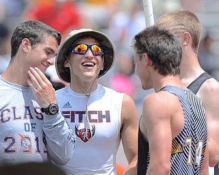 Jeff Lange | The Vindicator  JUNE 6, 2015 - Austintown Fitch senior Dylan Latone (center) shares a moment of laughter with his competitors during pole vault warmups at Jesse Owens Memorial Stadium during the 2015 state track and field tournament in Columbus, Saturday.