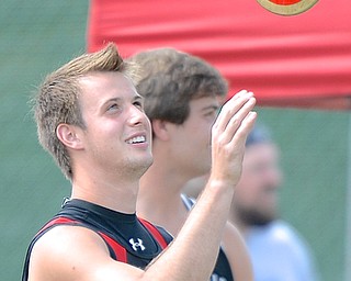 Jeff Lange | The Vindicator  JUNE 6, 2015 - Canfield's Andrew Hallof tosses his disc in the air as he waits for his turn to throw in the boys discus event during the 2015 state track and field tournament held at Jesse Owens Memorial Stadium in Columbus, Saturday afternoon.